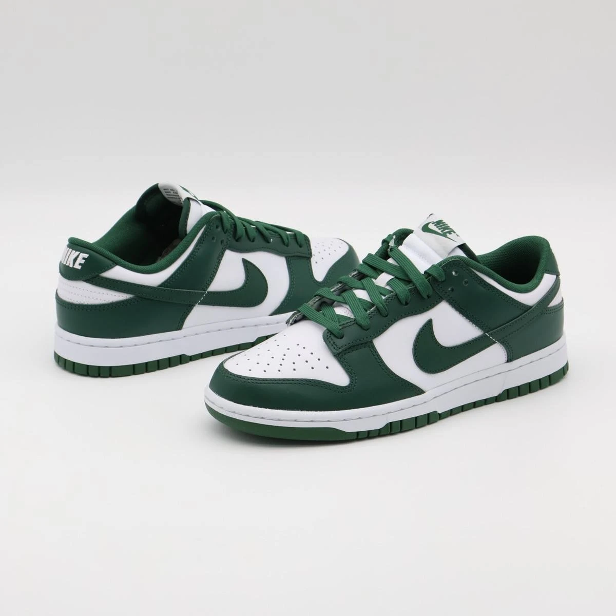 Nike Dunk Low Retro – White & Team Green Leather Sneakers